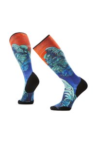 Sukat polpachi menampilkan desain biru cerah dan oranye dengan pola grafis, bagian kaki dan pergelangan kaki berwarna hitam, serta tekstur kain yang halus.
