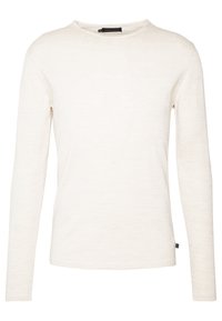 Lättviktig långärm skjorta i mjukt vitt tyg; har rund halsringning och smal passform. Etikettinformation synlig vid fållen.