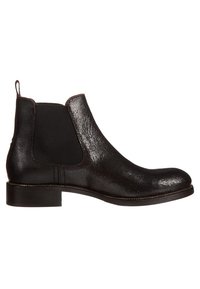 Botín Chelsea de cuero negro con panel lateral elástico, tirador en el talón y tacón bajo apilado.