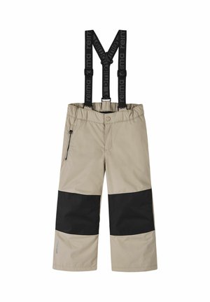 Pantalons de neige beiges avec bretelles noires réglables. Comprend une poche zippée et une section du genou noire. Fabriqué en matériau résistant à l'eau.