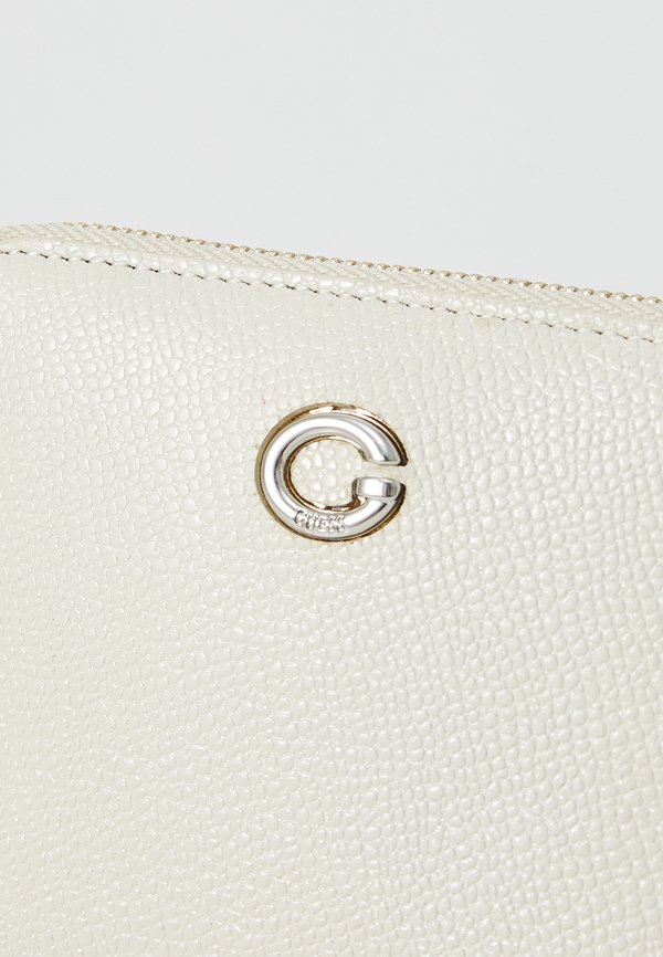 PUFFY SMALL ZIP AROUND - Wallet3