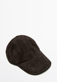 Brown suede baseball cap with a curved brim, visible stitching, and ventilation holes on the sides. Soft texture and structured design.