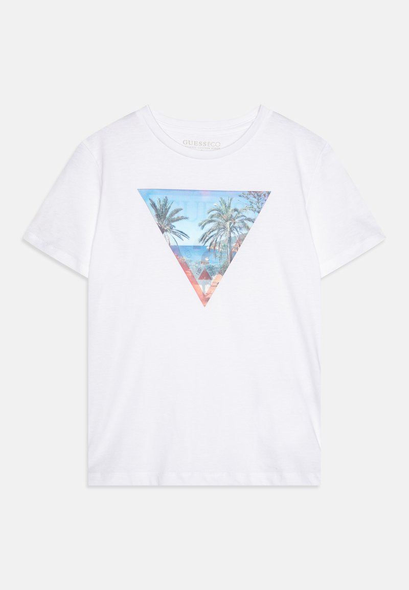 T-shirt en coton blanc avec un graphisme triangulaire de palmiers et d'océan dans des teintes de bleu, rose et orange. Manches courtes et col rond.