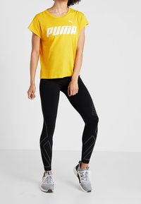 Puma Print T-shirt - yellow