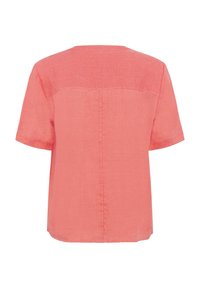 Chemise en lin corail rose à manches courtes avec une couture droite dans le dos et un empiècement en haut du dos.