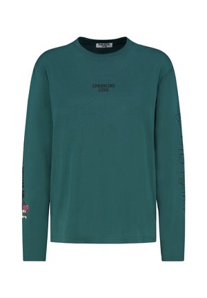Long-sleeve, teal cotton t-shirt with "SPARKLING LOVE" text on the front and graphic design featuring a character and text on the left sleeve.