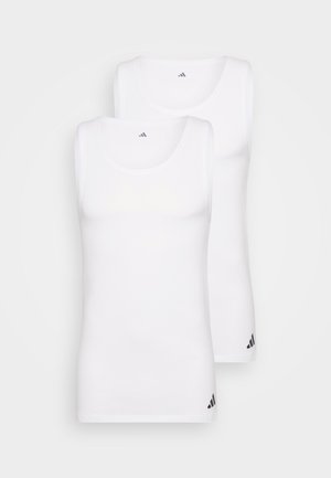 To hvide ærmeløse tank tops lavet af blødt stof. Hver har en rund halsudskæring og små sorte logo-detaljer nær sømmen.