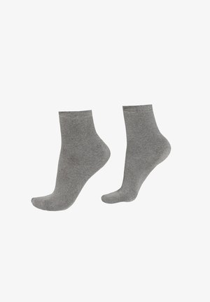 Gray ankle socks made of a soft, textured fabric with a smooth finish. The design features a standard cut and no visible patterns or accents.