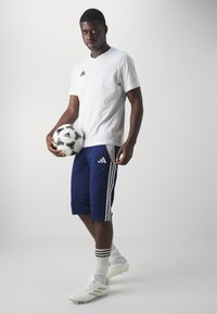 adidas Performance TIRO24  - 3/4 pikkuses spordipüksid - team navy blue/white