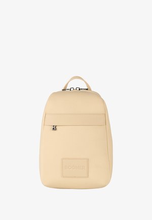Svetlo bež nahrbtnik iz gladkega blaga z zaobljeno obliko. Ima sprednji žep z zadrgo in logotipno značko na dnu.