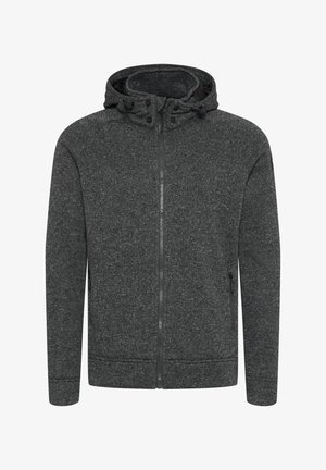 Kapuca siva, izdelana iz teksturirane tkanine. Ima sprednji zadrgo, dve stranski žepu in tesen kroj.