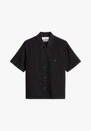 Black short-sleeve button-up shirt with a collar and single buttoned chest pocket made from denim fabric.