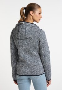Felpa con cappuccio navy e grigia melange, con cappuccio regolabile, chiusura zip frontale e tasche laterali. Presenta un tessuto testurizzato e un design aderente.
