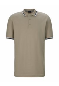 Beige poloshirt van katoen met een drieknoopsluiting, voorzien van contrasterende marineblauwe en witte strepen op de kraag en mouwen.