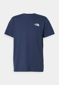 Navy blue cotton t-shirt with short sleeves, crew neckline, and white logo featuring a curved design on the left chest. Smooth texture.