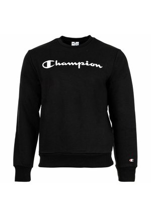Schwarzes Champion Sweatshirt mit langen Ärmeln und weißem Logo über der Brust sowie einem kleinen Logo-Patch am linken Ärmelbündchen.