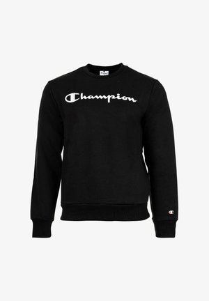 Schwarzes Champion Sweatshirt mit langen Ärmeln und weißem Logo über der Brust sowie einem kleinen Logo-Patch am linken Ärmelbündchen.