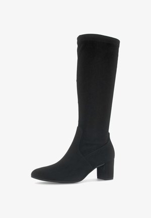 Bottes noires jusqu'aux genoux en tissu doux, avec un bout pointu, un talon bloc et sans fermetures ni motifs visibles.