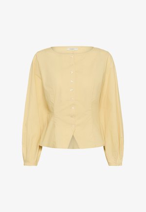 Hellgelbe Langarmbluse mit Rundhalsausschnitt, durchgehenden Knöpfen vorne, tailliertem Schnitt und leicht ausgestelltem Saum mit Vorderreißverschluss.
