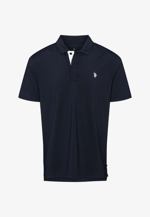 Temno modra polo majica iz mešanice bombaža, z klasičnim ovratnikom, dvema gumboma na sprednji strani in majhnim belim logotipom na prsih.