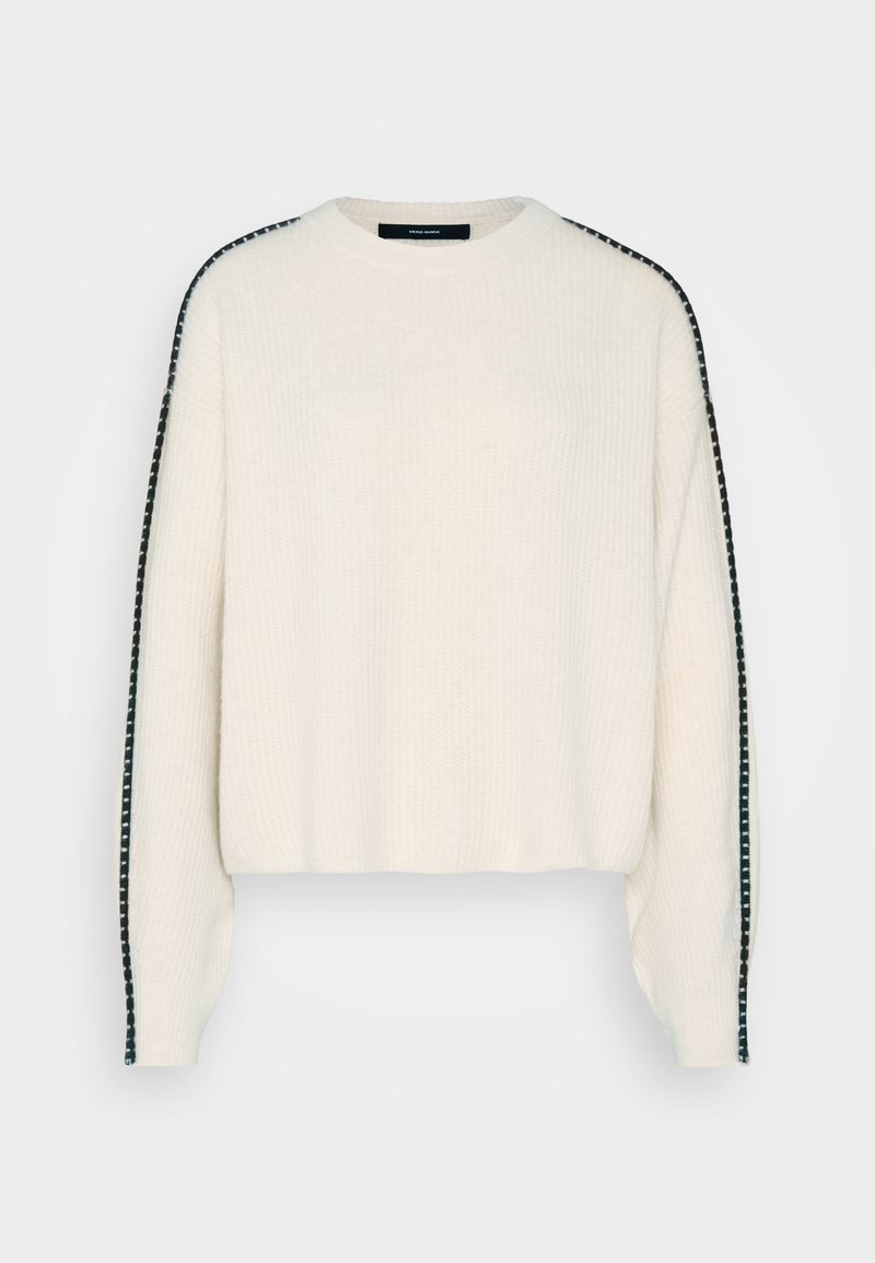 Cremfarbener Strickpullover mit lockerer Passform, der schwarze gestreifte Abschlüsse an den Schultern und eine gerippte Strickstruktur aufweist.