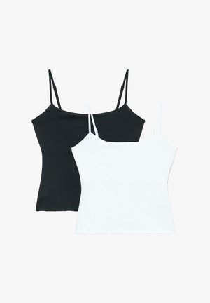 Deux camisoles ajustées avec fines bretelles, une noire et une blanche, superposées sur un fond blanc.
