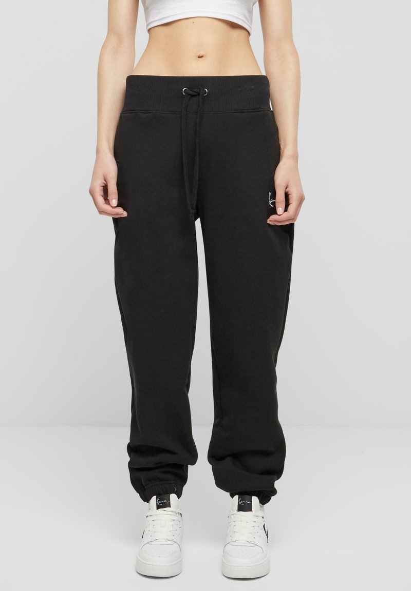 Karl Kani - SMALL SIGNATURE ESSENTIAL OS - Tracksuit bottoms - black, Enlarge