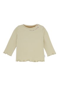 Beige Langarm-Babyshirt mit gewellten Kanten, Knopf an der Schulter und pinkem Text "du bist süß, ich liebe dich" mit Herz.