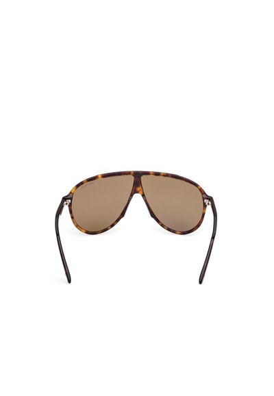 Skildpadde aviator solbriller med brune linser, tynde sorte metalkister og bløde former. Tekstureret ramme med kontrasterende farver.