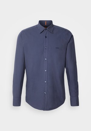 Camicia a maniche lunghe blu scuro, con bottone, realizzata in cotone, caratterizzata da un colletto classico, orlo curvo e ricamo del logo sul petto.