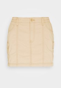 Kaki kjol med elastisk midja, knappstängning, framfickor och synliga sömdetaljer; rak skärning med en lätt texturerad yta.