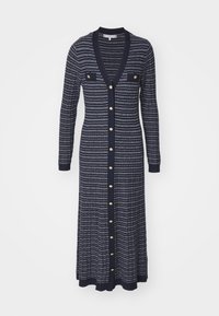 Námořnický a bílý pruhovaný dlouhý kardigan s knoflíkovým zapínáním, kapsami a žebrovanými manžetami. Vyrobeno z pletené tkaniny s jemnou texturou.