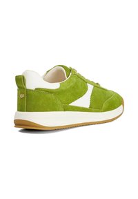 Green suede sneaker with white leather accents, round toe, flat rubber sole, and gold logo detail on the heel. Textured surface.