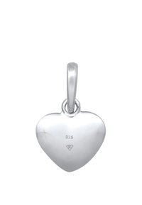 Pendentif en argent en forme de cœur, finition polie, avec une boucle pour attacher, gravé de "925" et d'un logo en diamant au dos.