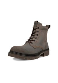 Brown leather ankle boot with a textured finish, round toe, and lace-up design. Features a sturdy rubber sole with a pronounced tread.