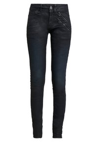 Svarta skinny jeans i denim med två dragkedjefickor fram och knappstängning. Snygg yta med en något blek finish.