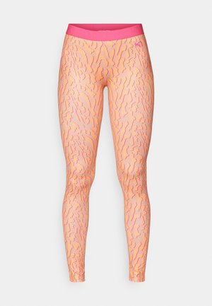 Leggings in peach with a wavy pink pattern, featuring a solid pink waistband. Made of stretchy, smooth material for comfort and flexibility.