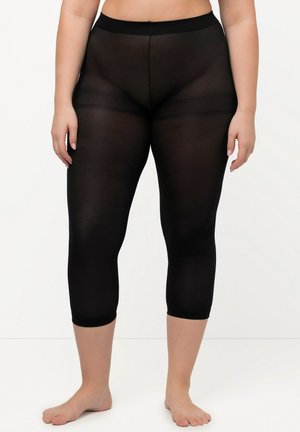 Schwarze Capri-Leggings aus einem durchsichtigen, dehnbaren Material mit einem elastischen Bund. Der Saum ist verarbeitet und der Stoff hat eine glatte Textur.