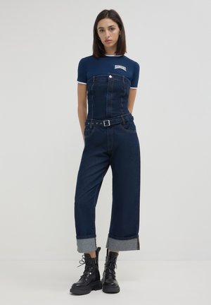 Calliope CON RISVOLTO - Jumpsuit - blu