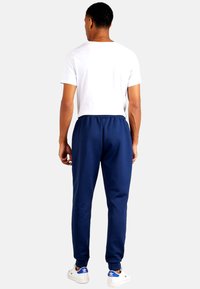 ellesse jogginghose blau