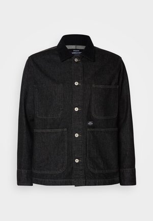 Black denim jacket with a pointed collar, button closure, two large front pockets, and a small logo tag on the lower right pocket.