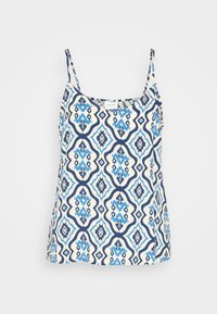 Bezramenný top s tenkými popruhy, bílý základ a modrý geometrický a květinový vzor opakující se po celé látce.