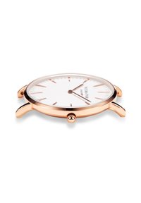Reloj redondo con una esfera blanca, caja de metal en oro rosa, agujas delgadas y una única corona. Diseño minimalista sin marcas adicionales.