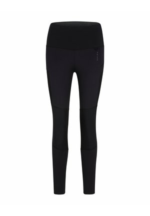 Leggings de sport noirs taille haute avec panneaux renforcés aux genoux et coupe ajustée, arborant un logo subtil sur la cuisse supérieure.
