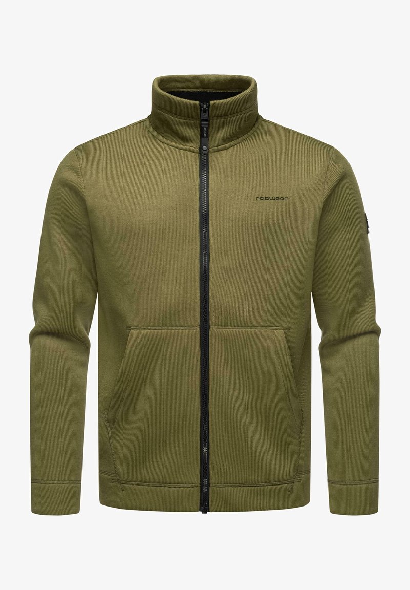 Giacca zip-up verde oliva realizzata in tessuto a costine, con colletto alto, due tasche frontali e dettagli in zip nera.