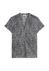 Blouse noire à manches courtes avec un motif de points blancs irréguliers et un décolleté en V sans col.