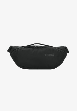 Schwarze Nylon-Umhängetasche mit sleekem Design, mit einem Reißverschluss hauptfach und einer kleinen Seitentasche. Mit "THULE"-Branding auf der Vorderseite.