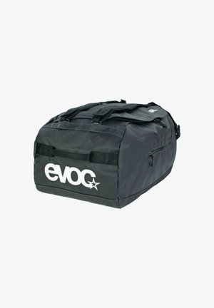 Black duffel bag with durable fabric, rectangular shape, top handles, side zipper pocket, and white logo on the front.