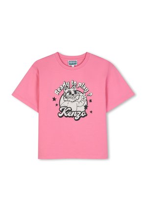 T-shirt rose à manches courtes avec un chat dessin animé, des étoiles noires et le texte « Ready to play? Kenzo » sur le devant.