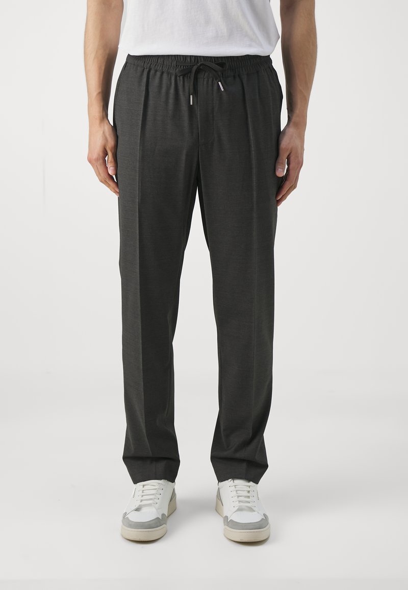 Dunkelgraue Hose aus weichem Stoff, mit einem elastischen Bund und verstellbarem Kordelzug, in gerader, lässiger Passform.